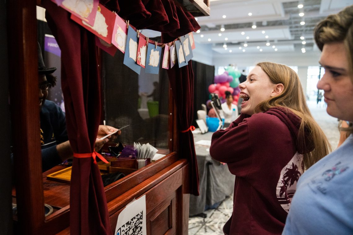 Delighted Mitzvah Girl in front of Zoltar Booth - Handy Entertainment